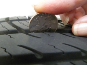 tire-check-with-quarter-2.png